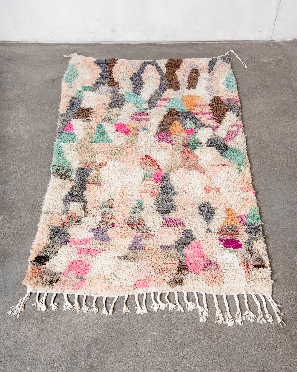 Modern, designer, handcrafted Berber rug from Morocco. Vintage carpet with beautiful colours and patterns and fluffy texture.
